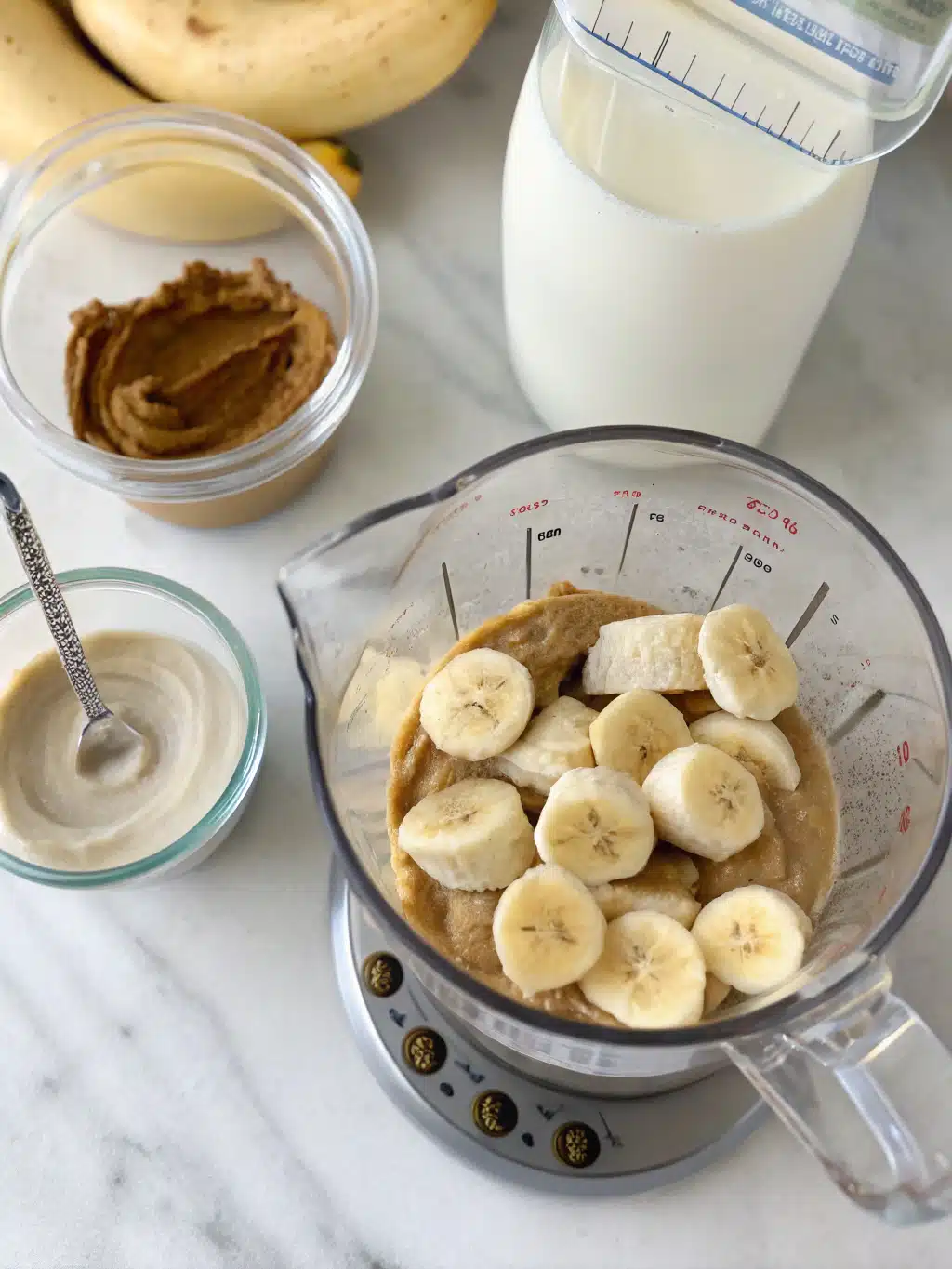 Blending a creamy snickerdoodle protein shake with cinnamon swirls