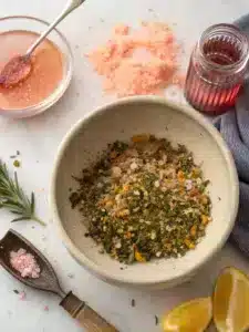 Make a flavorful pink salt recipe with Himalayan salt, rosemary, and spices. Perfect as a finishing salt for grilled meats or roasted veggies.
