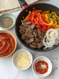 Classic sloppy joes recipe with savory ground beef simmered in a tangy tomato sauce, served on toasted buns for a hearty meal.