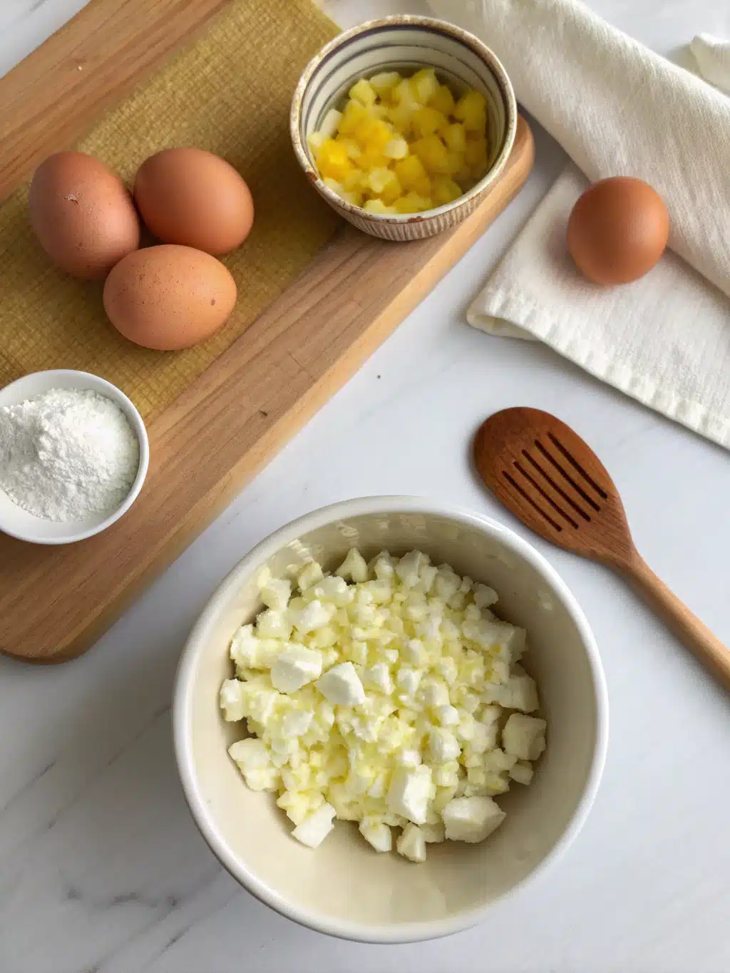 Sautéing onions and spices for Greek tomato eggs in a skillet