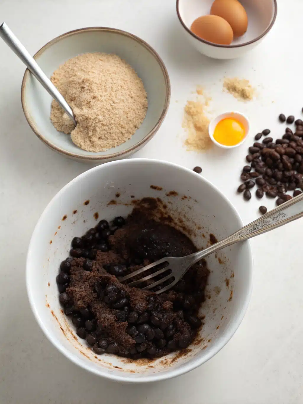 Mixing black bean burger ingredients in a bowl