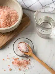 Boost weight loss with this pink salt detox drink featuring Himalayan pink salt, lemon, and honey—sip it warm in the morning for best results.