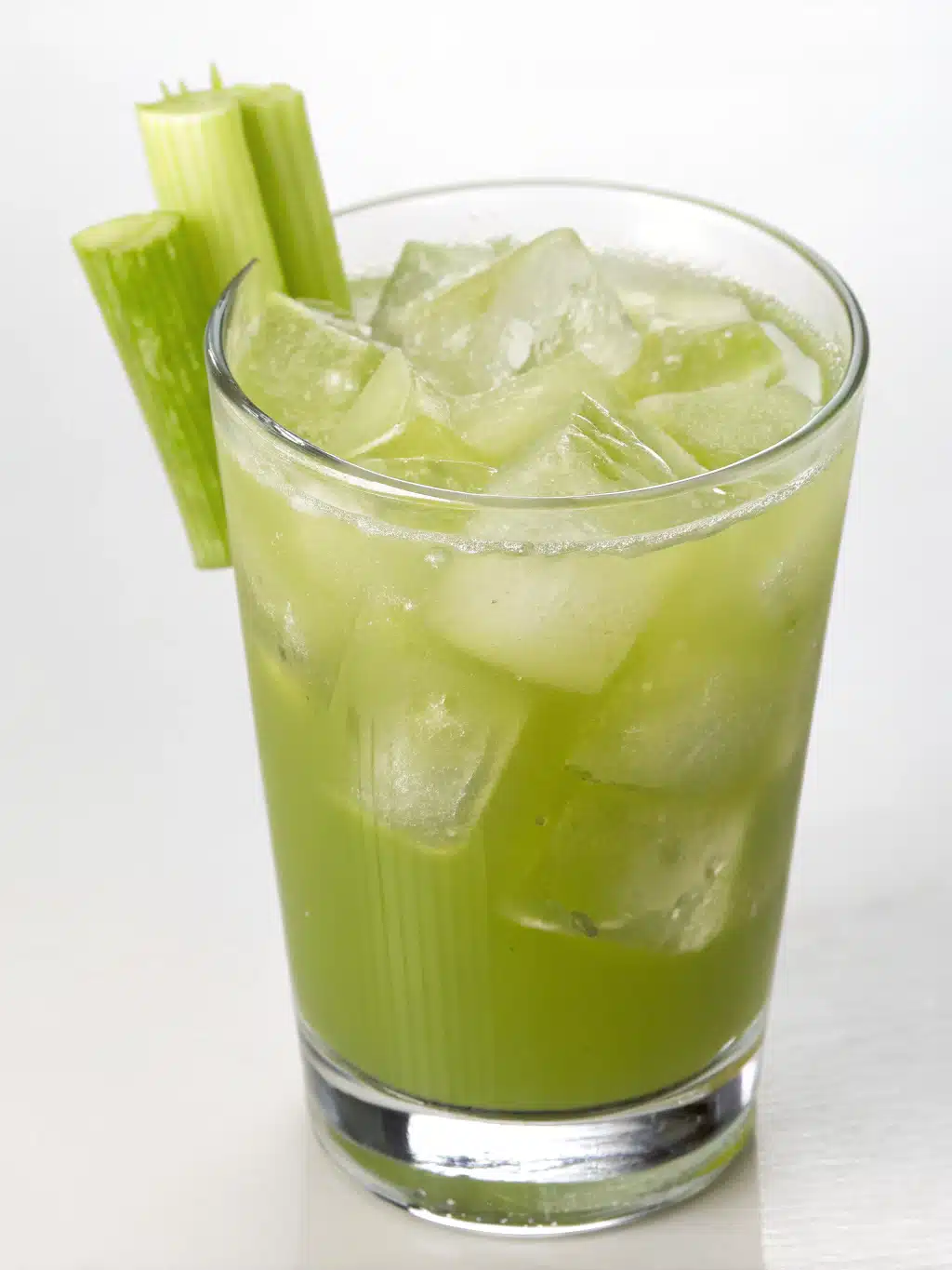 Elegant serving of ozempic juice recipe in glass tumblers with cucumber garnish