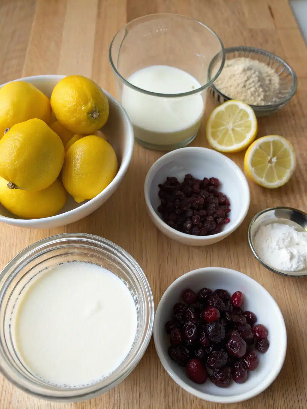 Gathering ingredients for cherry citrus dessert Fresh ingredients for homemade lemon cherry gelato on a rustic table