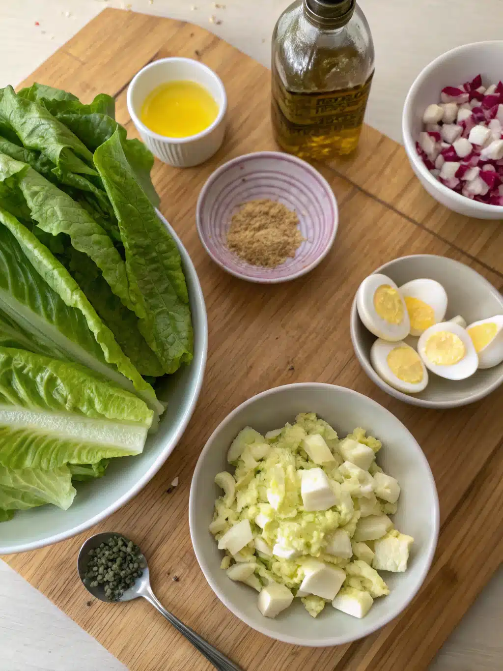 Fresh ingredients for wilted lettuce salad on a wooden table