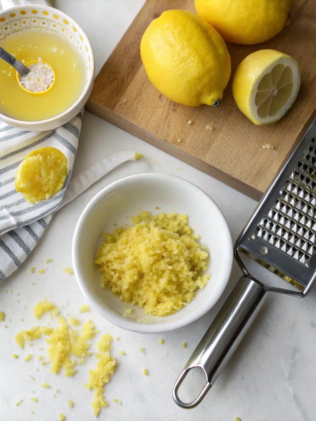 Creamy lemon sherbet mixture being whisked in a bowl