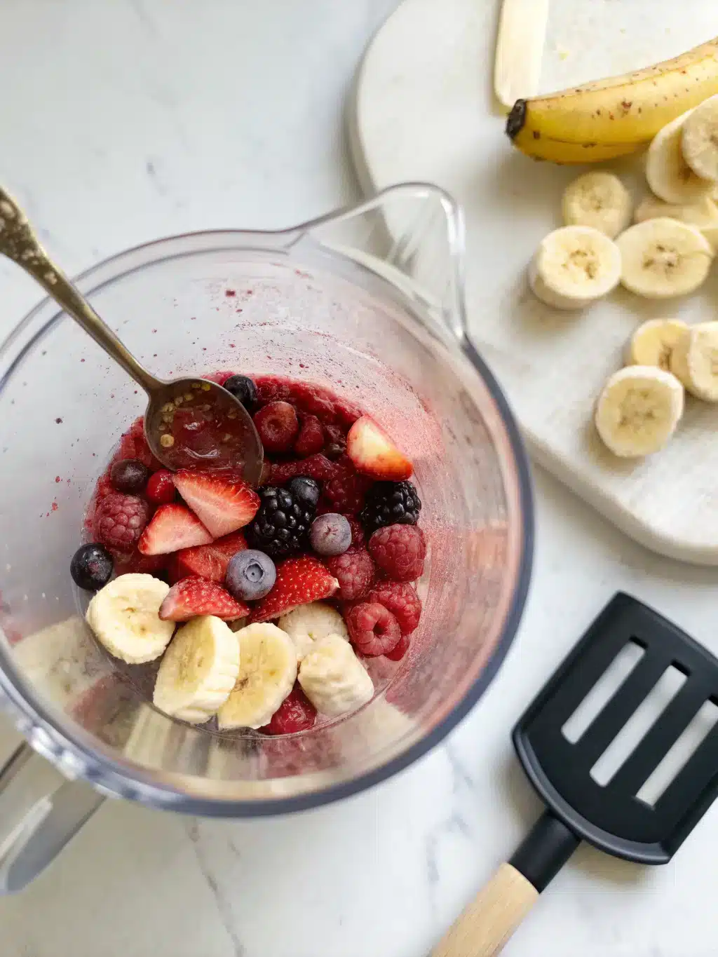 Finished creamy diabetic smoothie in a glass with a straw