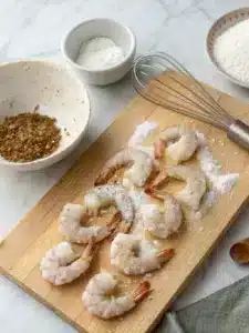 This Bang Bang Shrimp appetizer is crispy, fried shrimp tossed in a creamy, spicy and slightly sweet sauce and served with a crunchy cabbage slaw. This version is inspired by the Rock Shrimp at Nobu–my absolute favorite!