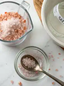 Refreshing pink salt drink for weight loss with lemon, honey, and ginger—perfect for a hydrating, lightly spiced sip. Serve chilled over ice.