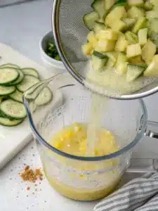 Refreshing pineapple cucumber juice recipe made with ripe pineapple, crisp cucumber, and lime, served over ice for a cool, hydrating drink.