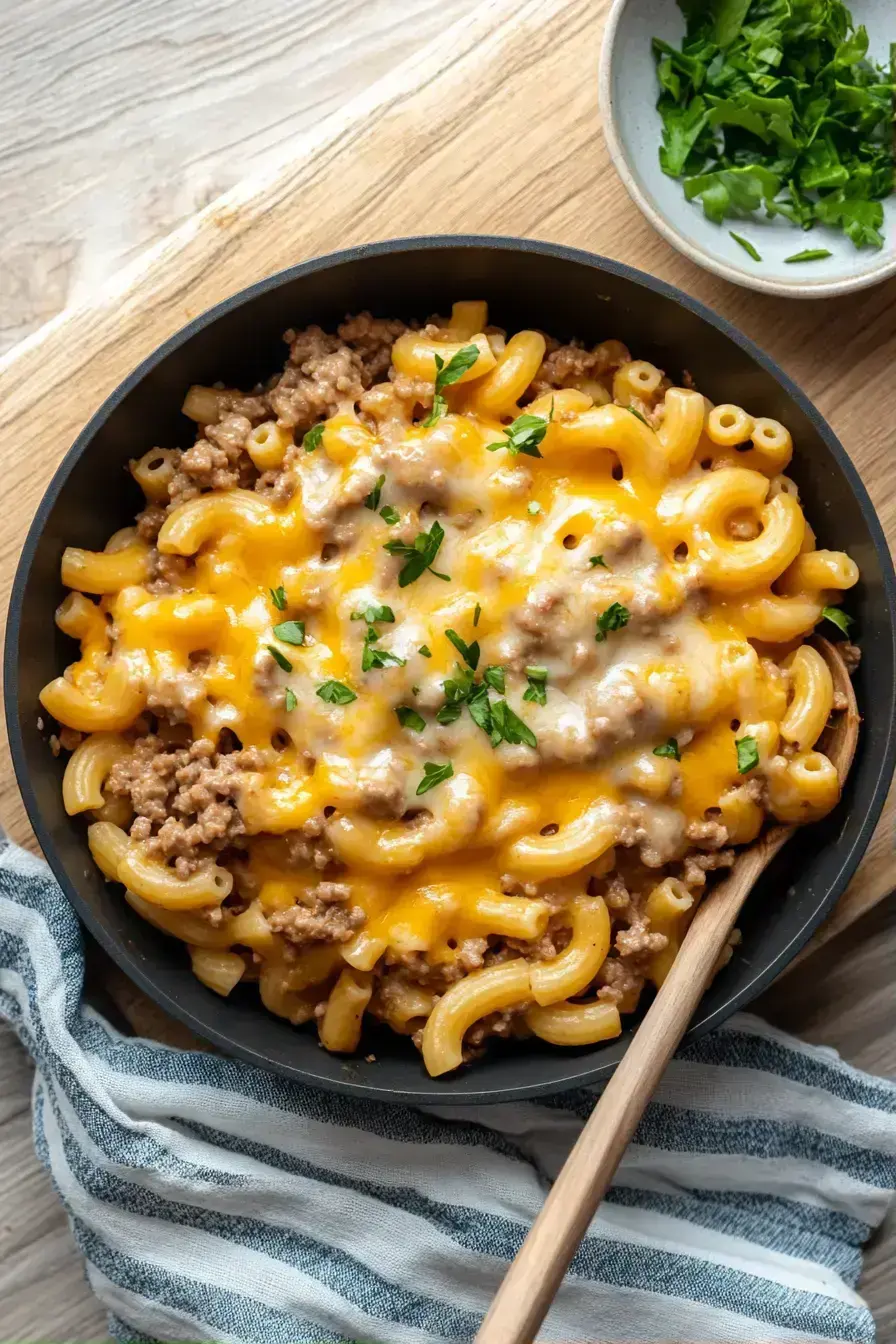 The final plated serving of Cheeseburger Pasta with melted cheese