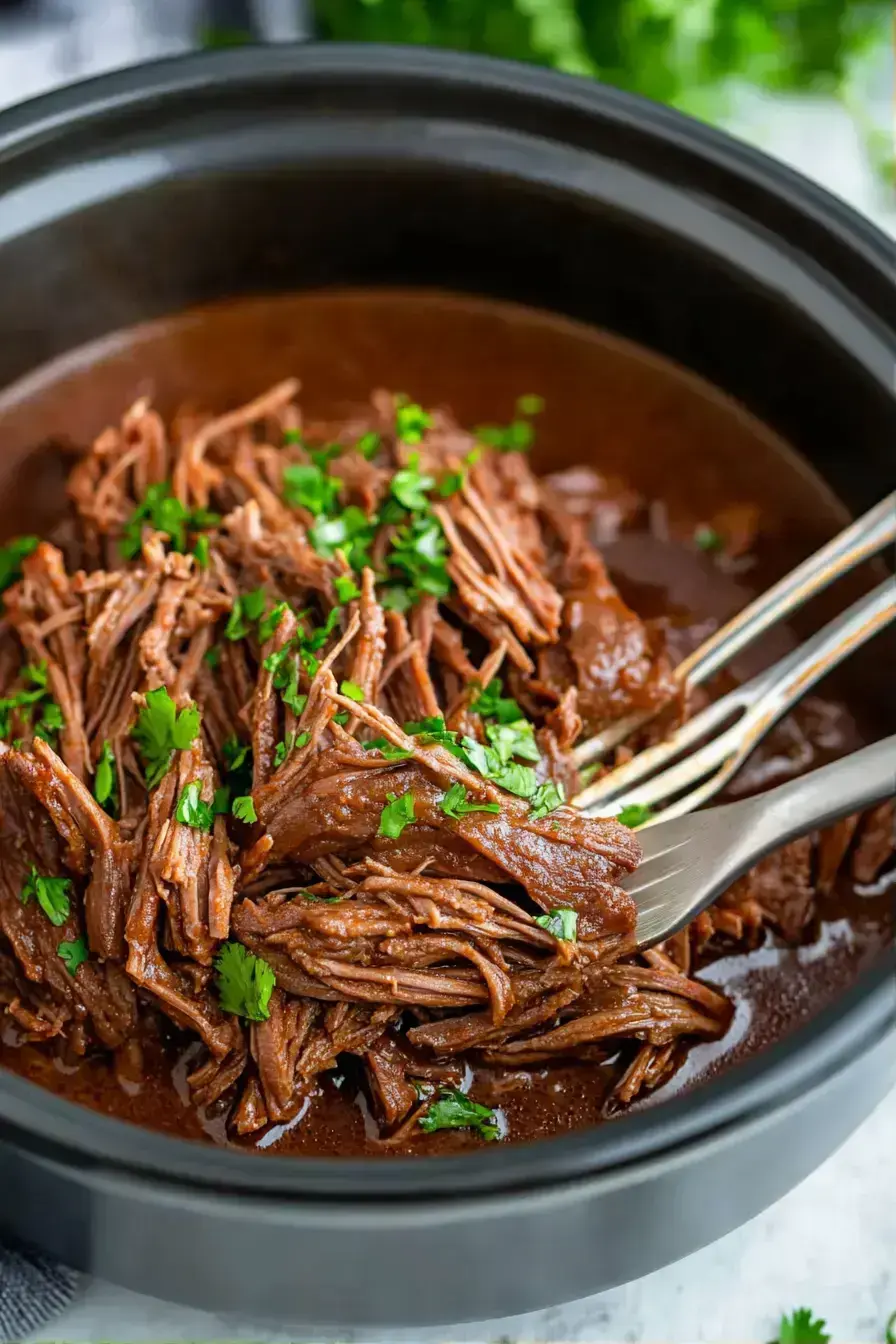 Final plated slow cooker tacos with all the delicious toppings