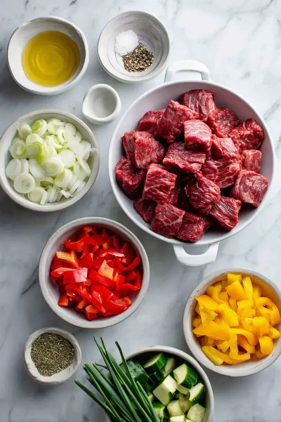 Ingredients for Steak Pie Recipe including beef and vegetables
